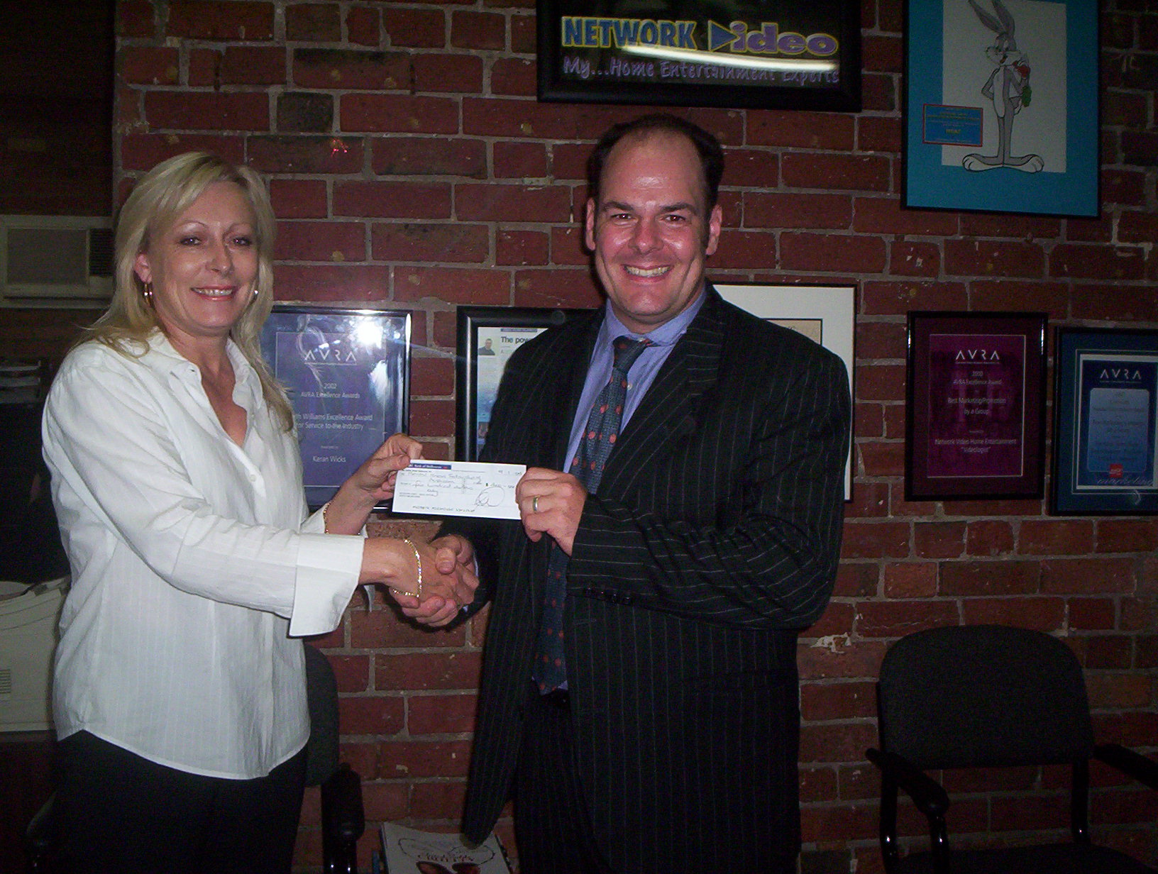 Keran presenting Network’s donation to the White Ribbon Foundation, 2007
